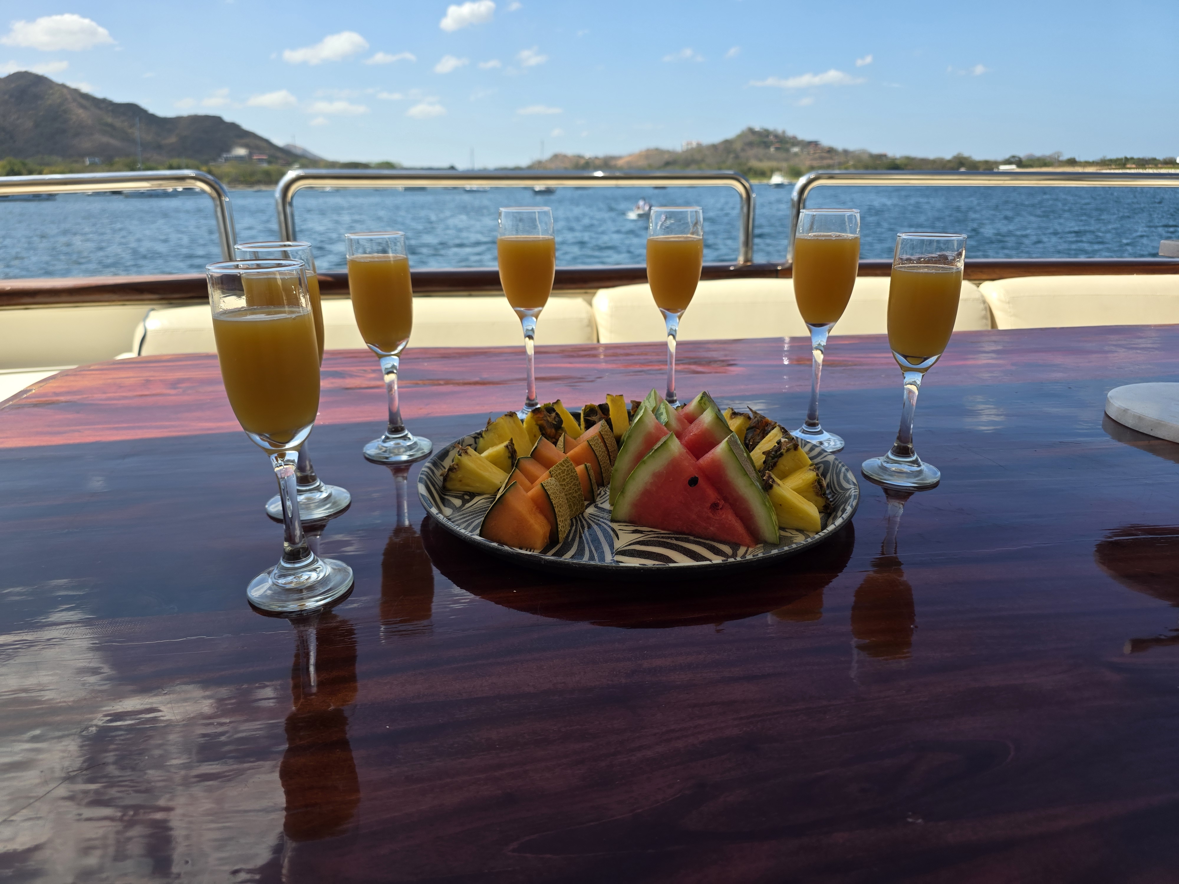 Fresh fruit and mimosas on deck